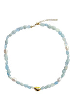 Load image into Gallery viewer, Handcrafted aquamarine necklace with natural gemstone nuggets, freshwater pearls, and gold-tone accents.