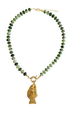 Load image into Gallery viewer, Handmade Cala Necklace featuring natural green gemstone beads with a gold fish charm from the Earth & Pearl Collection.