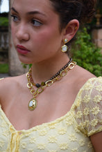 Load image into Gallery viewer, Model wearing Camille gold-plated freshwater pearl drop earrings.