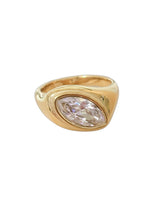 Load image into Gallery viewer, Valeria gold-plated stainless steel signet ring with a horizontal marquise-cut clear crystal.