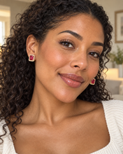 Load image into Gallery viewer, Model wearing ruby-red Valentina halo stud earrings