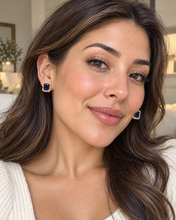 Load image into Gallery viewer, Model wearing dark indigo blue Valentina halo stud earrings