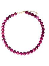 Load image into Gallery viewer, Rosalia handmade necklace with round pink agate beads in fuchsia, plum and smoky tones with an 18k gold-plated clasp.
