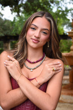 Load image into Gallery viewer, Rosalia handmade necklace with round pink agate beads in fuchsia, plum and smoky tones with an 18k gold-plated clasp.
