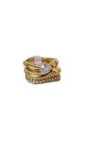 Load image into Gallery viewer, Amara gold-plated stainless steel stackable ring set with pear-cut and pavé clear crystals.
