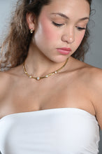 Load image into Gallery viewer, Aurora gold-tone stainless-steel collar necklace with five clear teardrop cubic zirconia stones
