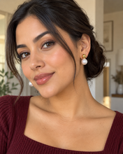 Load image into Gallery viewer, Model wearing Luna waterproof gold and pearl duo earrings by Samis Handmade Jewelry
