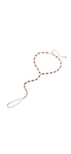 Load image into Gallery viewer, Rosé gold-plated hand chain bracelet with pink crystal accents and finger loop
