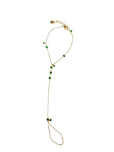 Load image into Gallery viewer, Emerald Drop gold-tone stainless-steel hand chain with green crystal accents and finger loop
